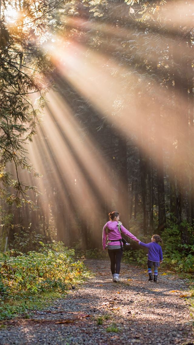 1080x1920 woman walking in forest with child - cute iPhone 8 Wallpaper