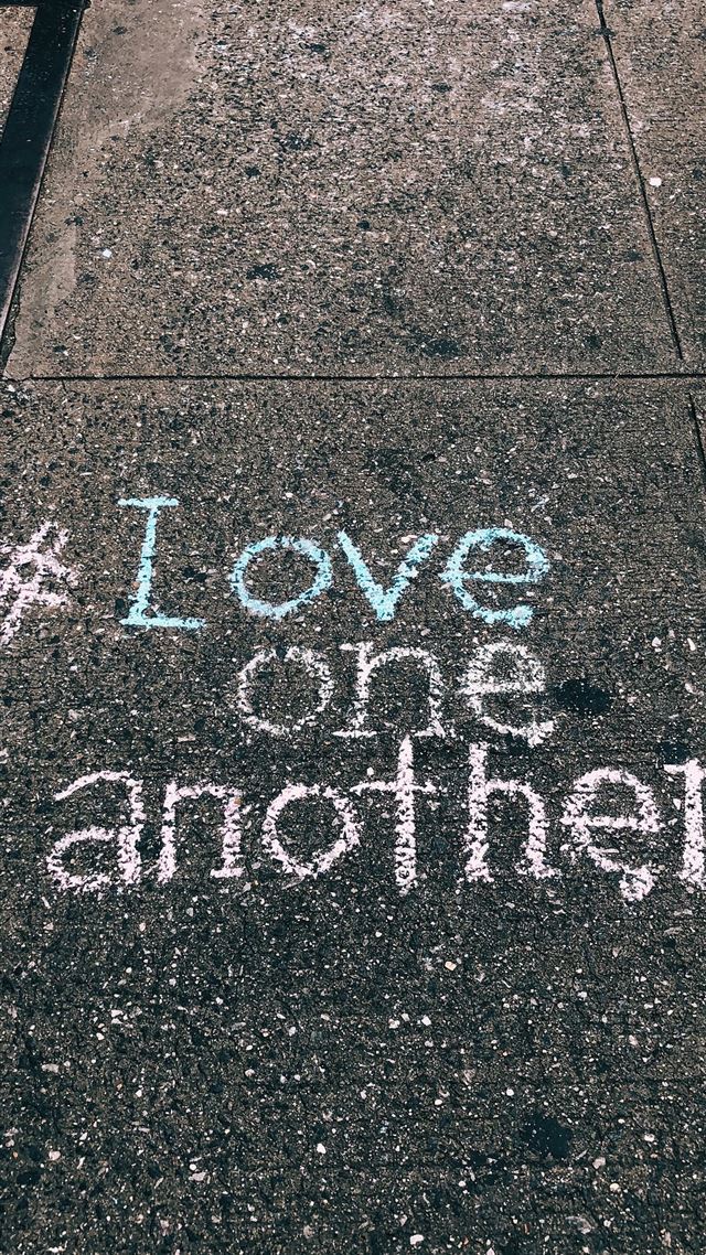 1080x1920 love one another chalk written on concrete floor - quotes iPhone 8 Wallpaper