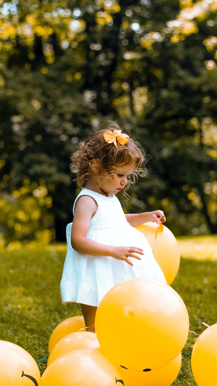 girl wearing white sleeveless dress beside balloon... iPhone 8 wallpaper 