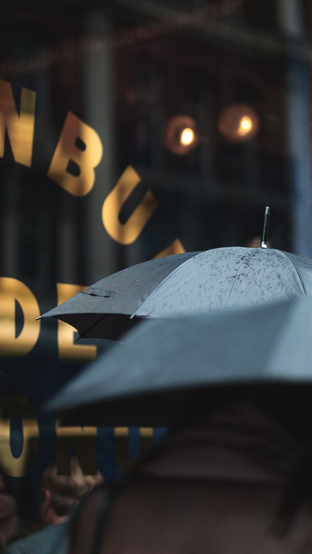 1080x1920 man on blue umbrella - soho iPhone 8 Wallpaper