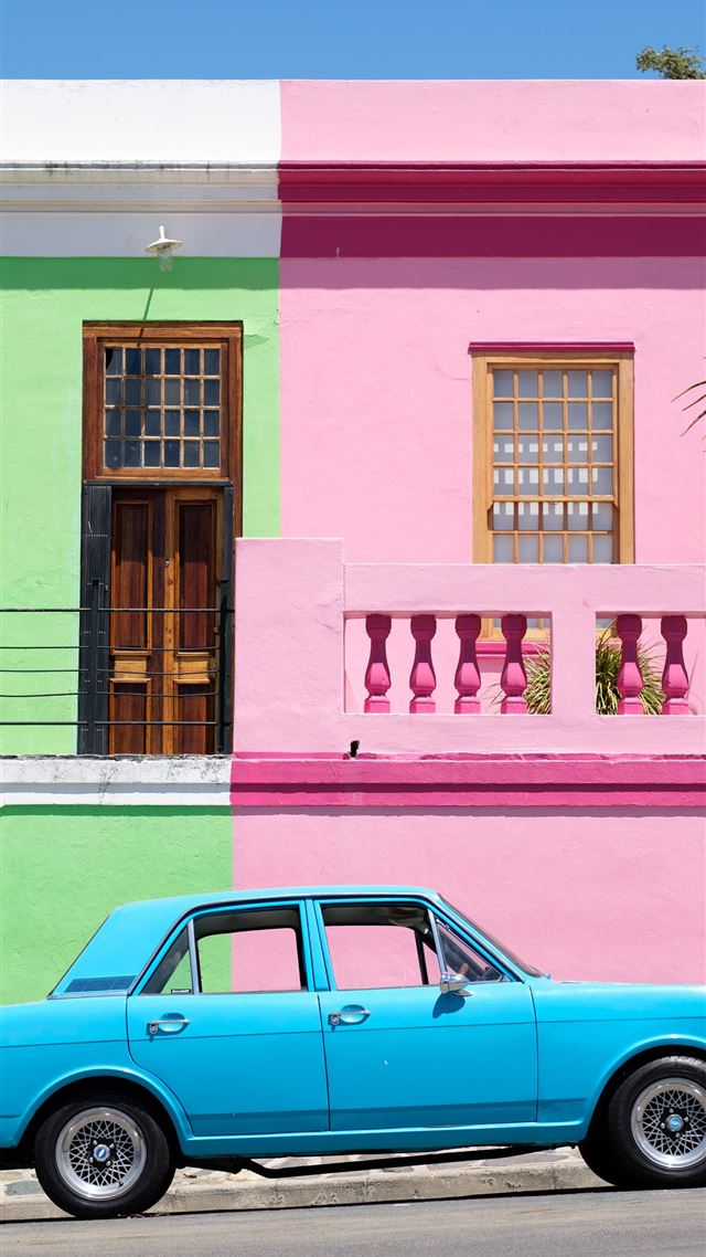 1080x1920 blue sedan parked beside pink and green house - south africa iPhone 8 Wallpaper