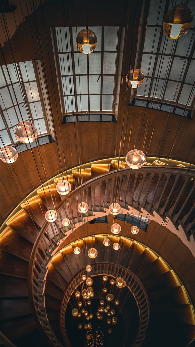 1080x1920 twirl stairs with chandeliers - orange iPhone 8 Wallpaper