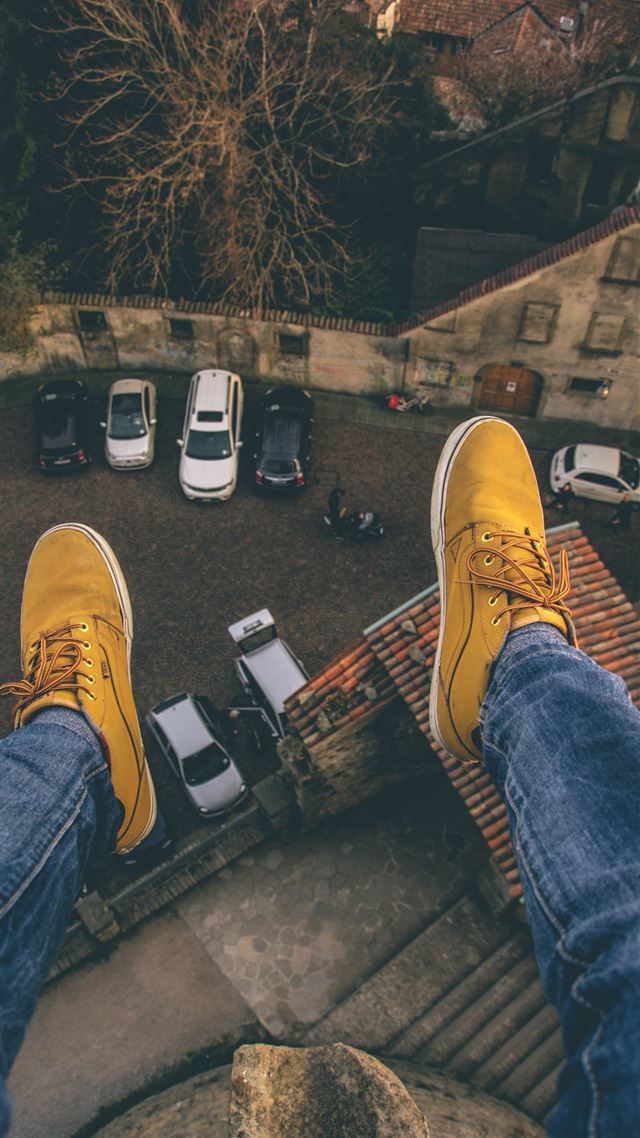 1080x1920 person sitting on rooftop - car iPhone 8 Wallpaper