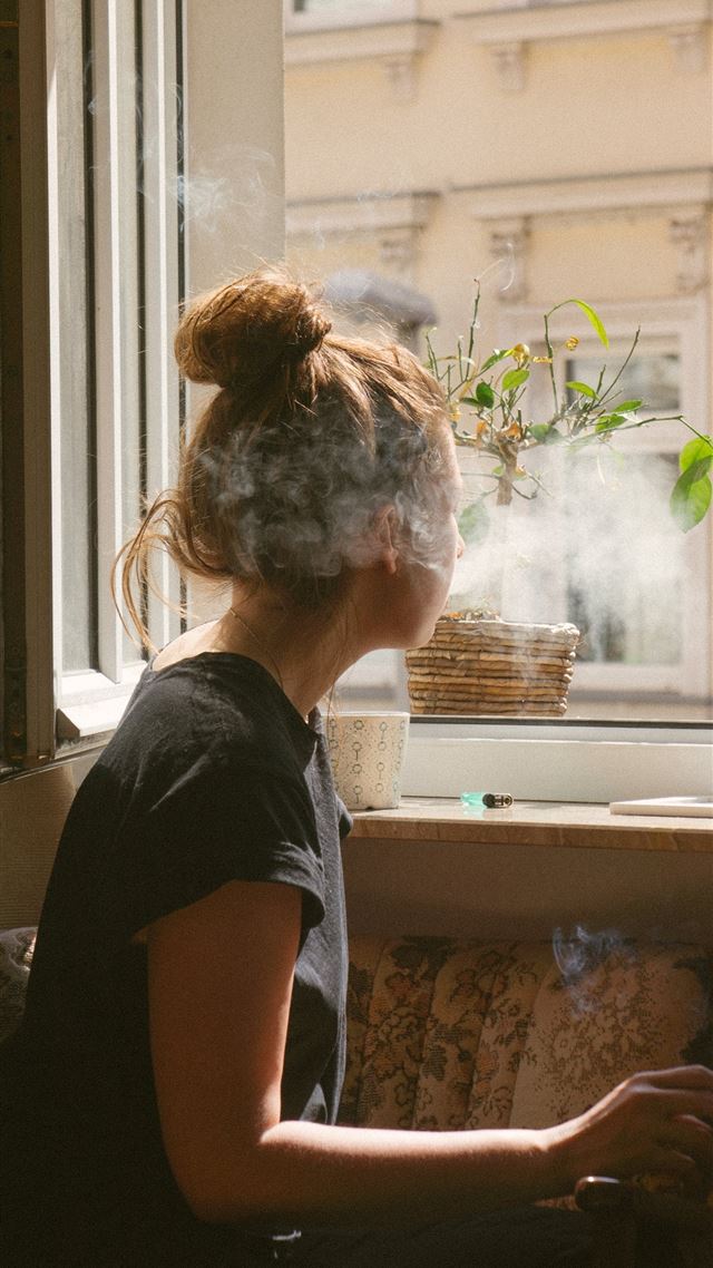 1080x1920 woman smoking while look through the window - spring iPhone 8 Wallpaper