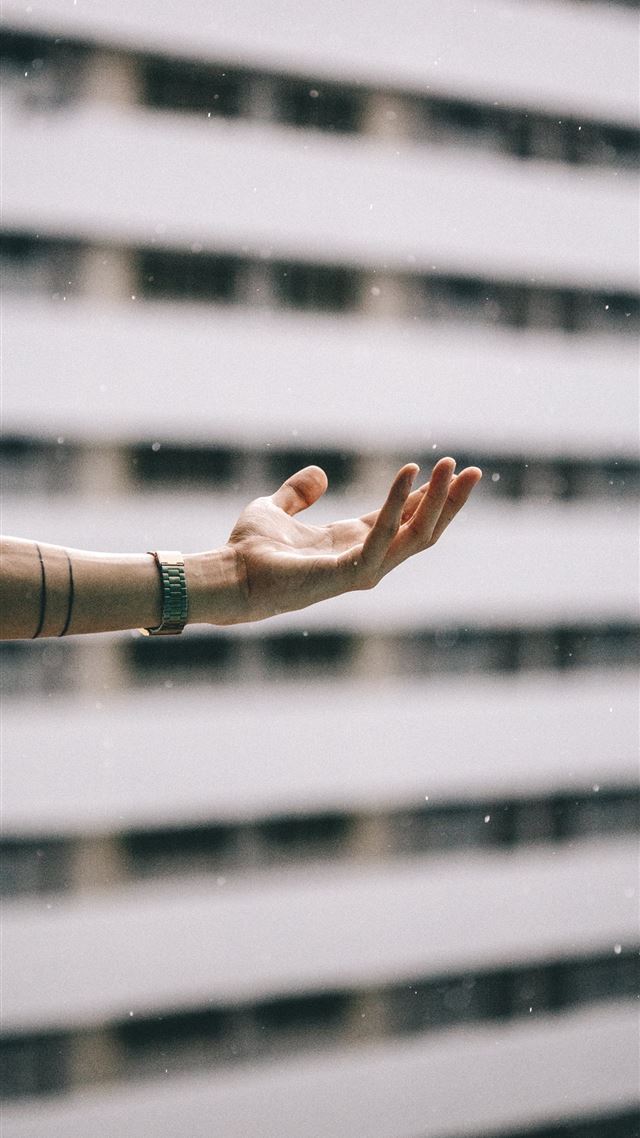 1080x1920 person standing beside building - rain iPhone 8 Wallpaper