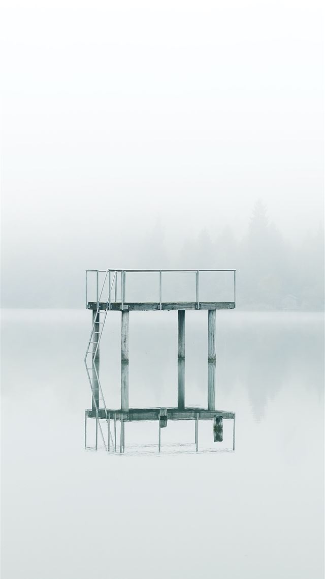 1080x1920 photography gray metal tower near body of water du... - fall iPhone 8 Wallpaper