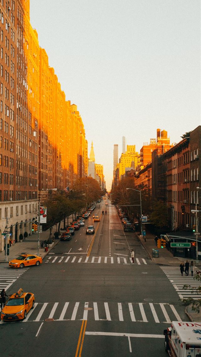 1284x2778 concrete road beside building during golden hour -  iPhone 8 Wallpaper