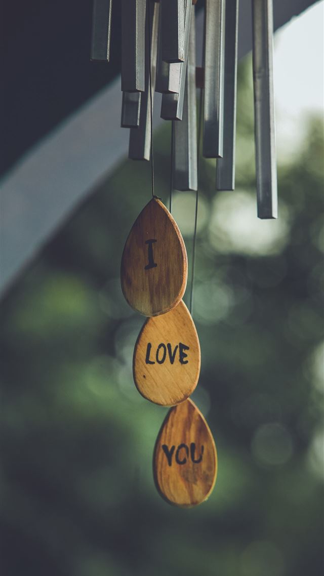 1284x2778 focus photography of gray and brown wind chimes - music iPhone 8 Wallpaper