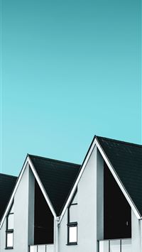white and black building during daytime wallpaper