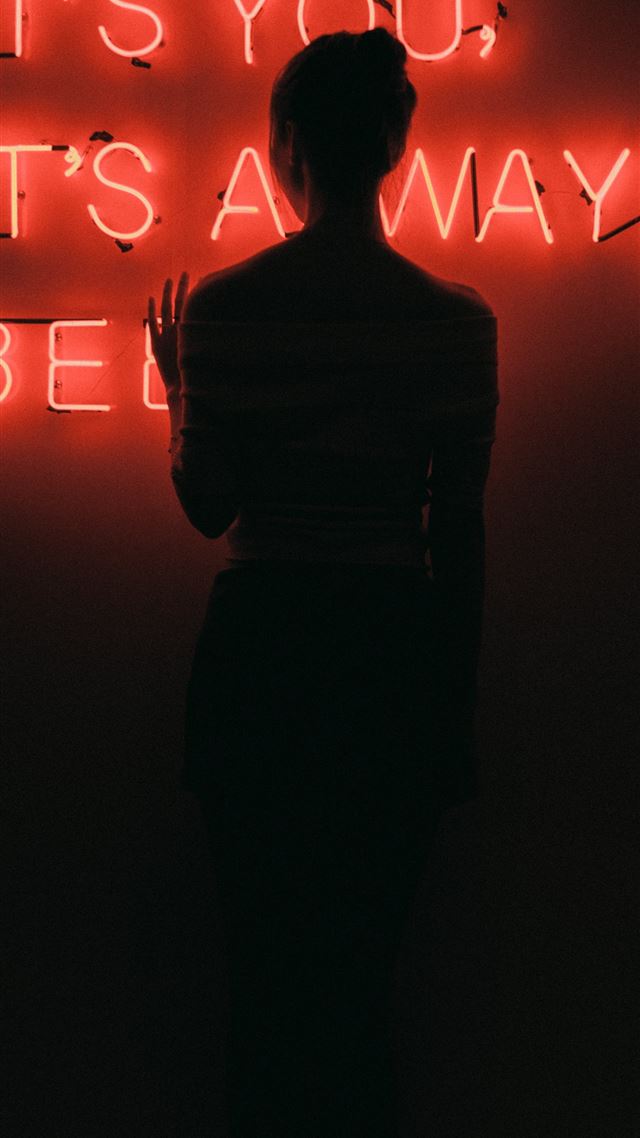 1284x2778 silhouette of woman standing in front of red neon ... - red iPhone 8 Wallpaper