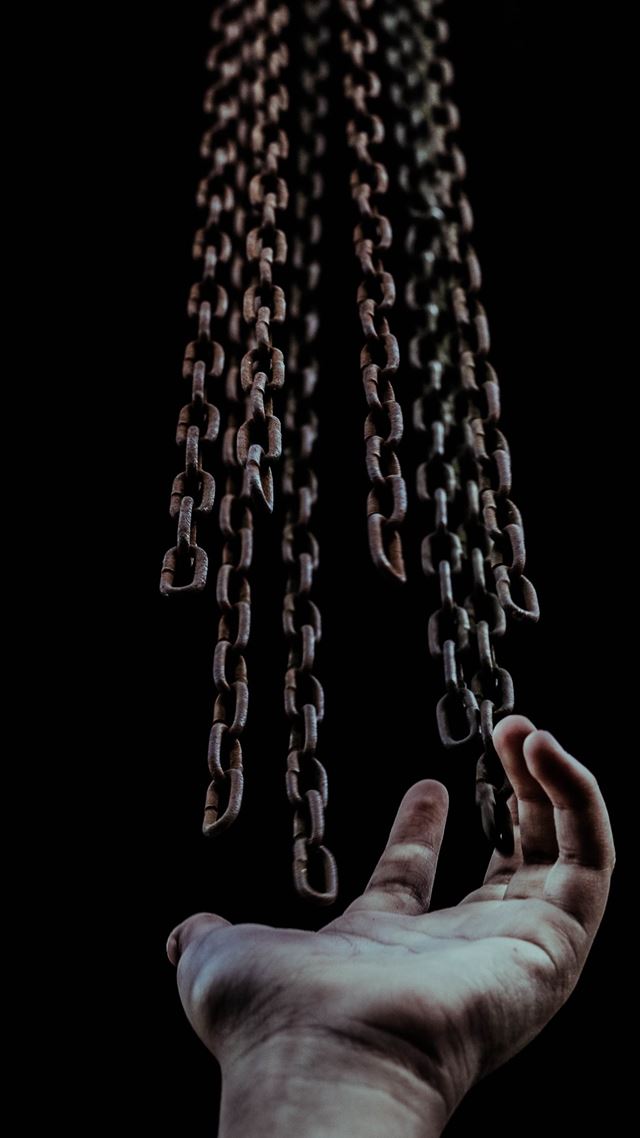 1284x2778 man's hand and chains - black iPhone 8 Wallpaper