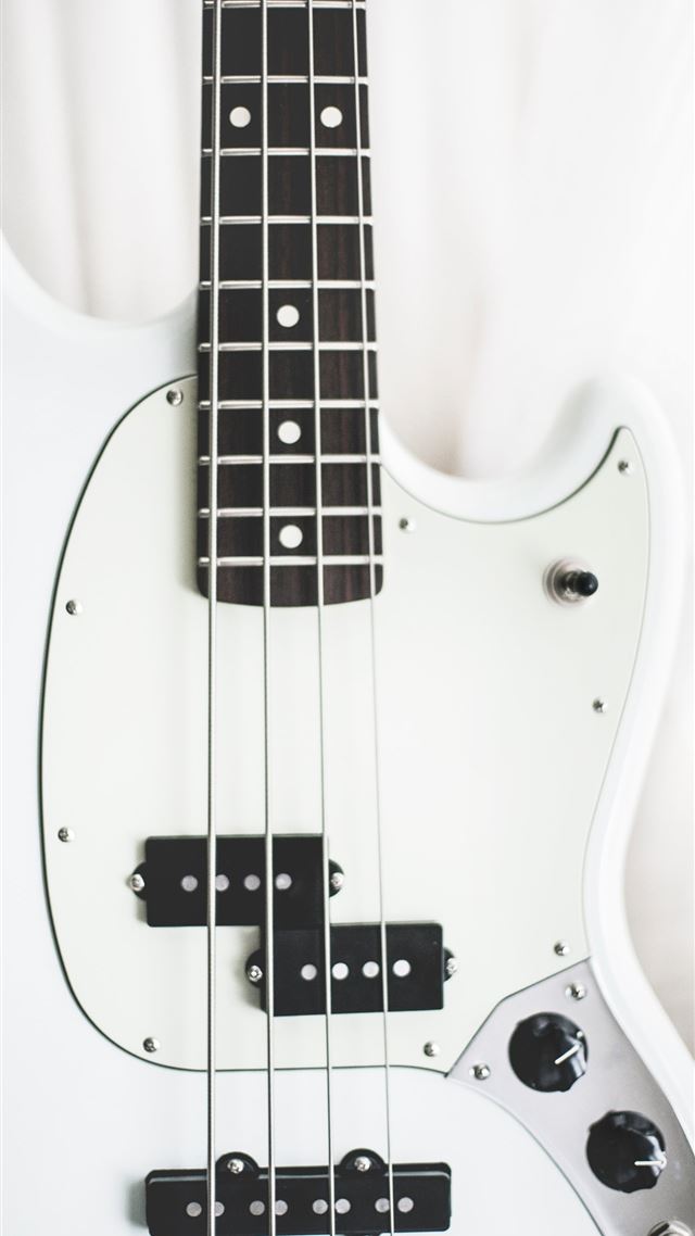 1284x2778 white and black electric bass guitar on white surf... - black iPhone 8 Wallpaper