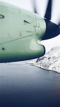 white plane flying over lake wallpaper