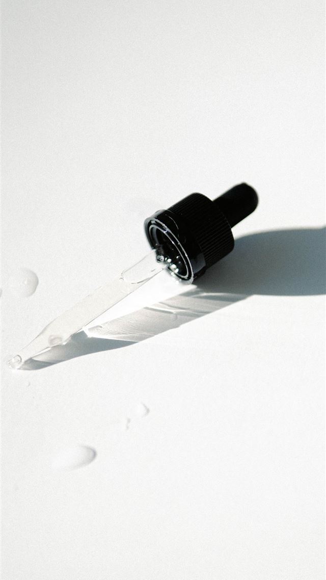 1284x2778 black and silver tube on white surface -  iPhone 8 Wallpaper