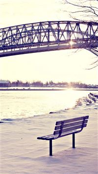 Lonely Bench Under Sunset River Bank Bridge wallpaper