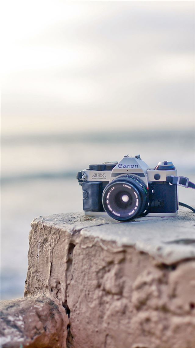 1080x1920 Canon Camera On Rock Stone -  iPhone 8 Wallpaper