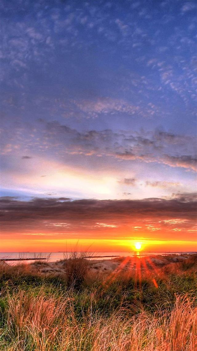 1080x1920 Brilliant Sunset Over Sea Beach Skyscape - grassland iPhone 8 Wallpaper