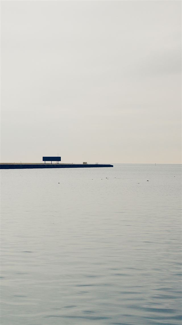 1080x1920 Minimal Vast Ocean Coast Bridge - skyline iPhone 8 Wallpaper