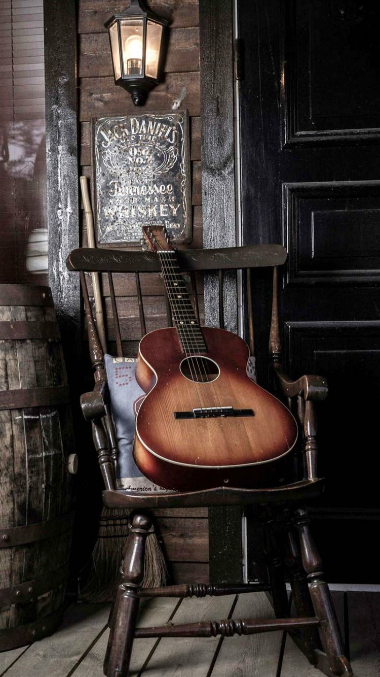 Old Guitar On Chair iPhone 8 Wallpapers
