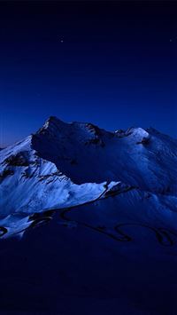 Night Sky Over Snow Mountain Peak wallpaper