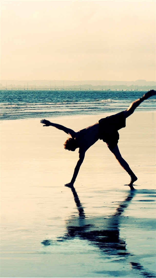 1080x1920 Sea shore silhouette water jump - jump iPhone 8 Wallpaper