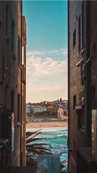 Bondi beach between two houses wallpaper