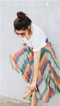 Girl in rainbow skirt wallpaper