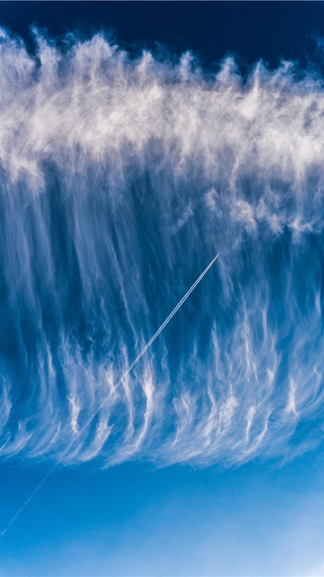 1080x1920 Sky surfing   Airplane skytrail (contrail) in a wa... - coast iPhone 8 Wallpaper