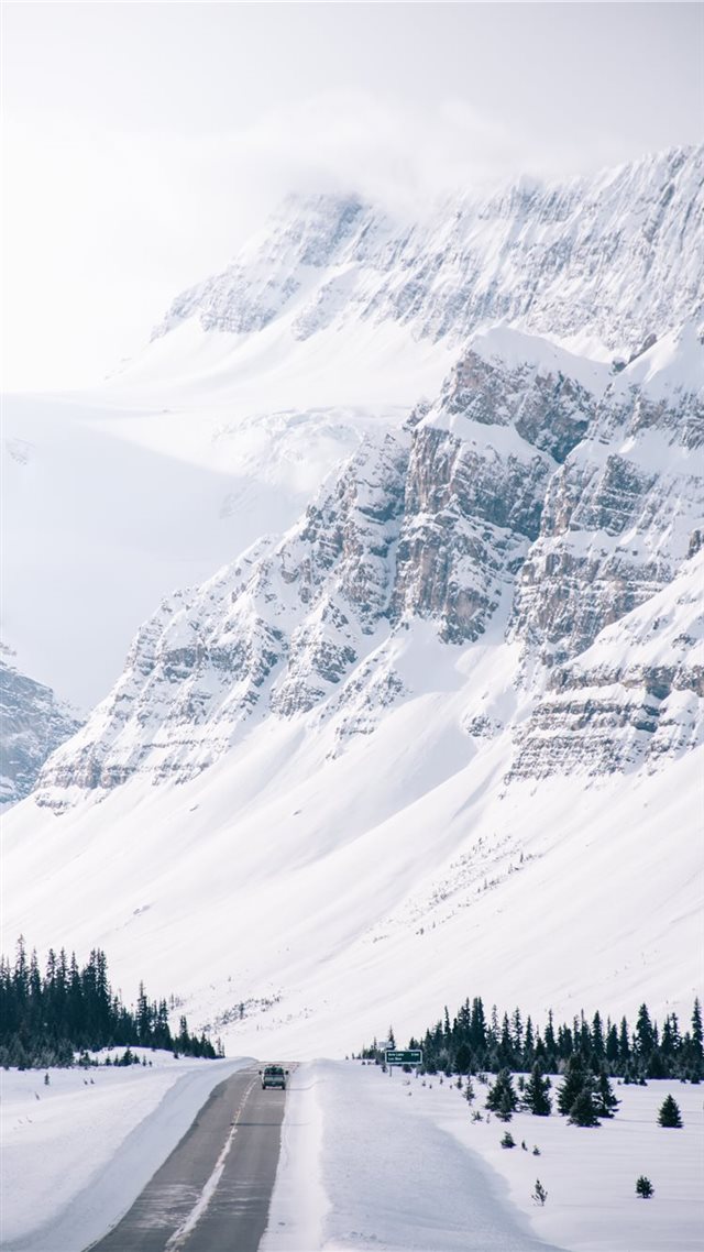 1080x1920 white snow covered hills and road side - mountain iPhone 8 Wallpaper