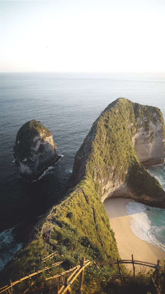 1080x1920 land formation near body of water during daytime - ocean iPhone 8 Wallpaper