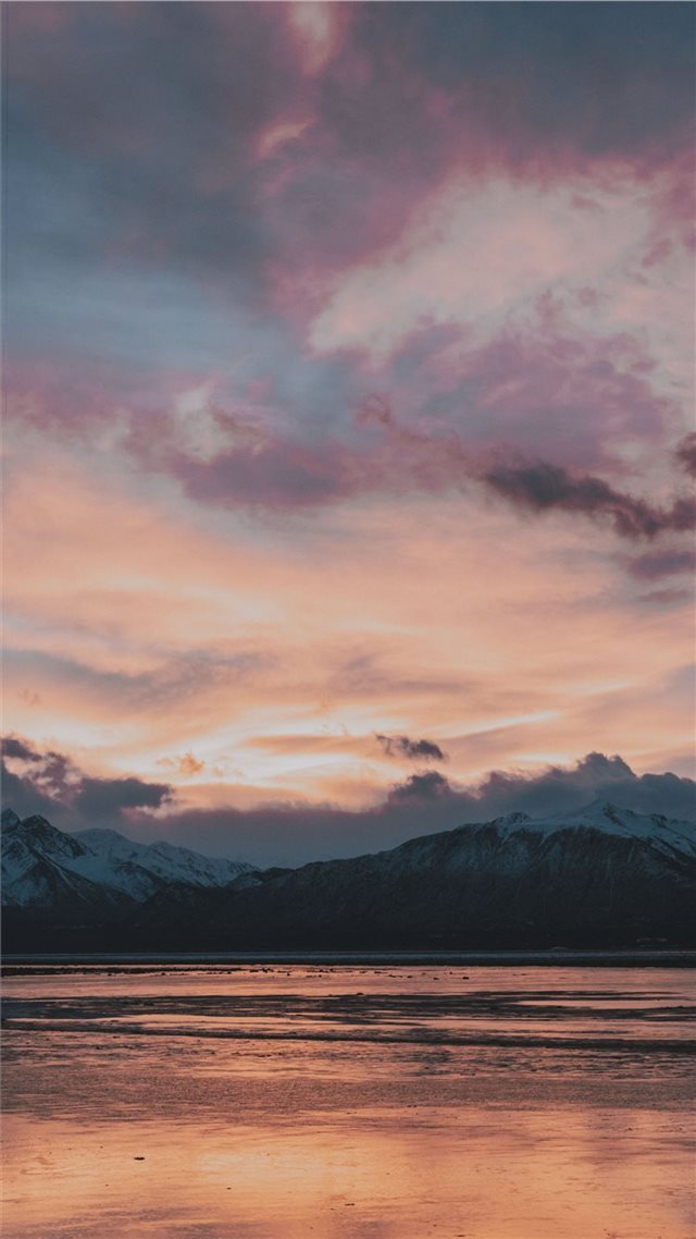 1080x1920 black mountain in front of body of water - mountain iPhone 8 Wallpaper
