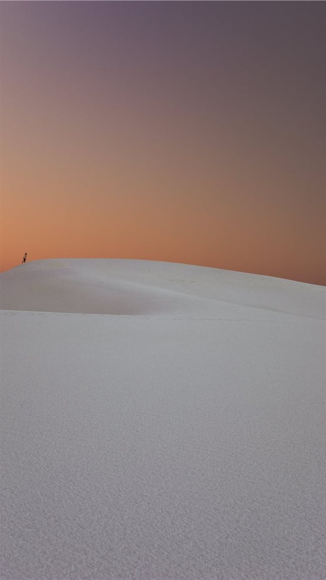 1080x1920 person walking in the desert dunes - united states iPhone 8 Wallpaper