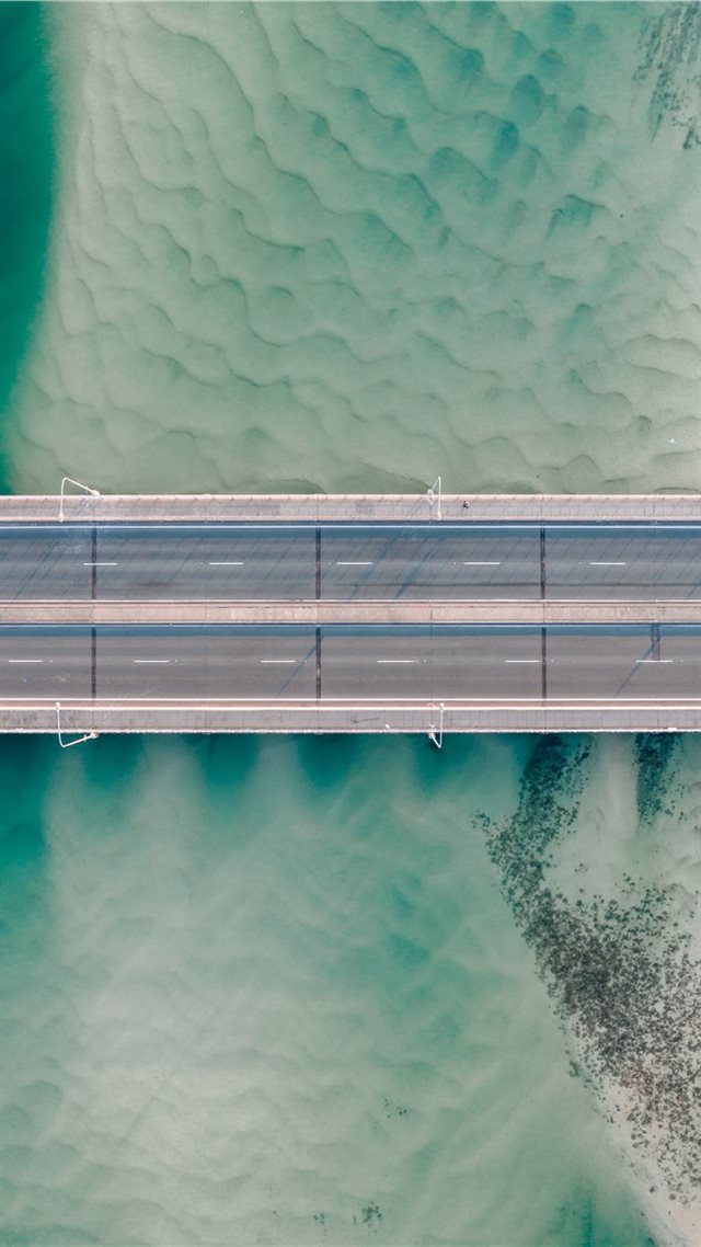 1080x1920 high angle photo of gray concrete road - water iPhone 8 Wallpaper
