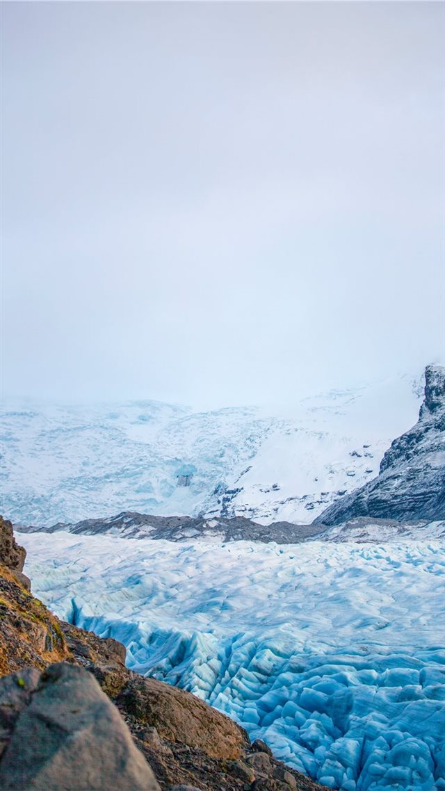 1080x1920 white mountains during daytime - iceland iPhone 8 Wallpaper