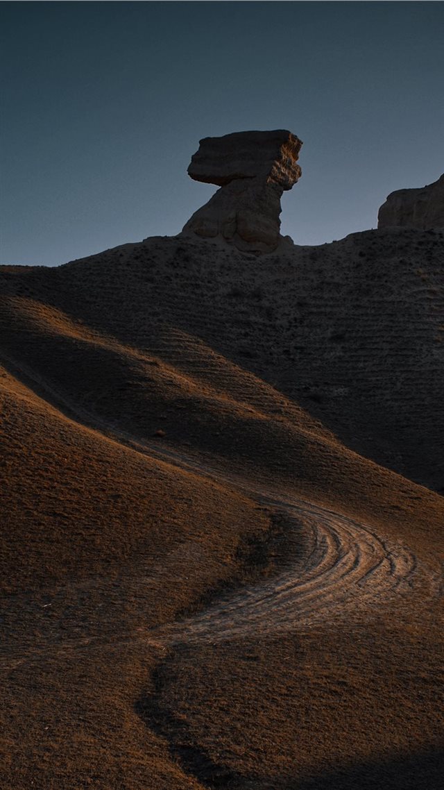 1080x1920 road leading to rock foormation - light iPhone 8 Wallpaper