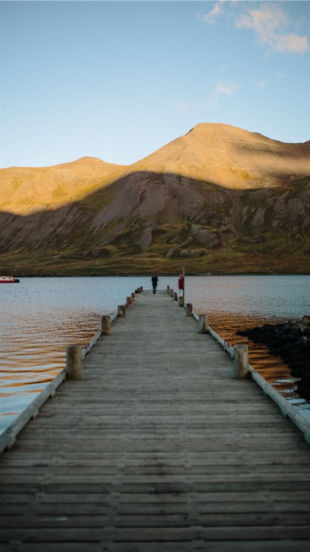 1080x1920 person standing at edge of dock - ocean iPhone 8 Wallpaper