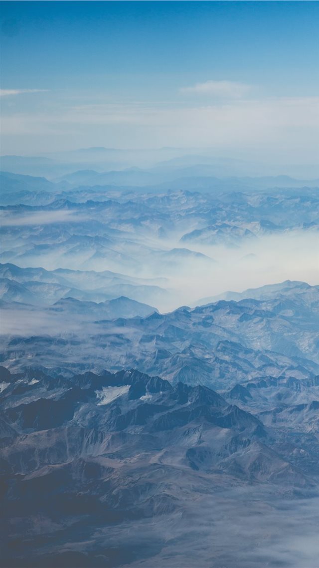 1080x1920 mountain under blue sky at daytime - clouds iPhone 8 Wallpaper