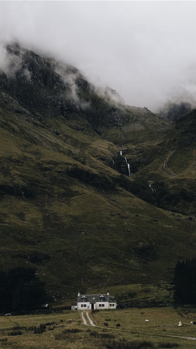1080x1920 landscape photography of house under mountain - united kingdom iPhone 8 Wallpaper
