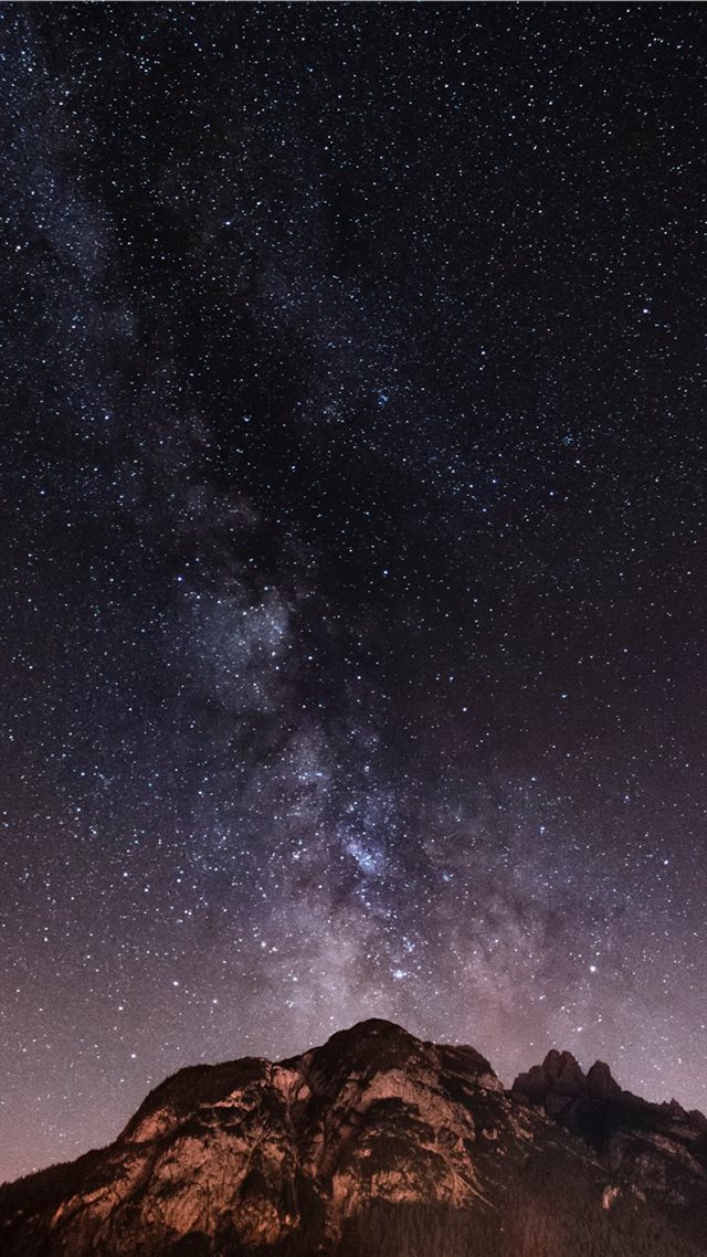 1080x1920 brown and black mountain during starry night - space iPhone 8 Wallpaper