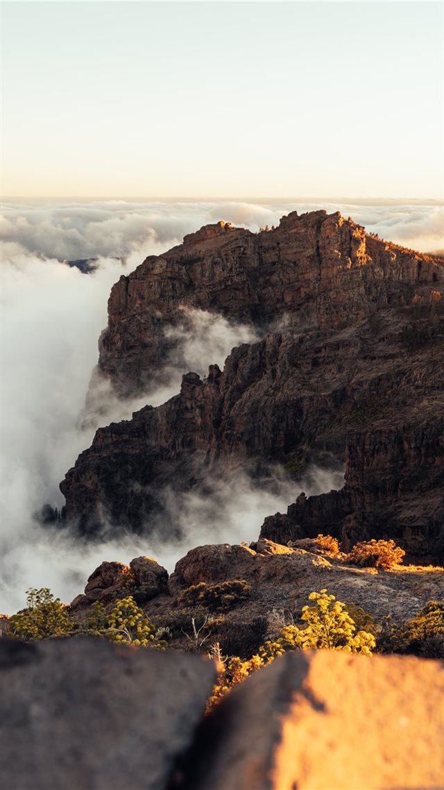 1080x1920 rocky mountains and fog - water iPhone 8 Wallpaper