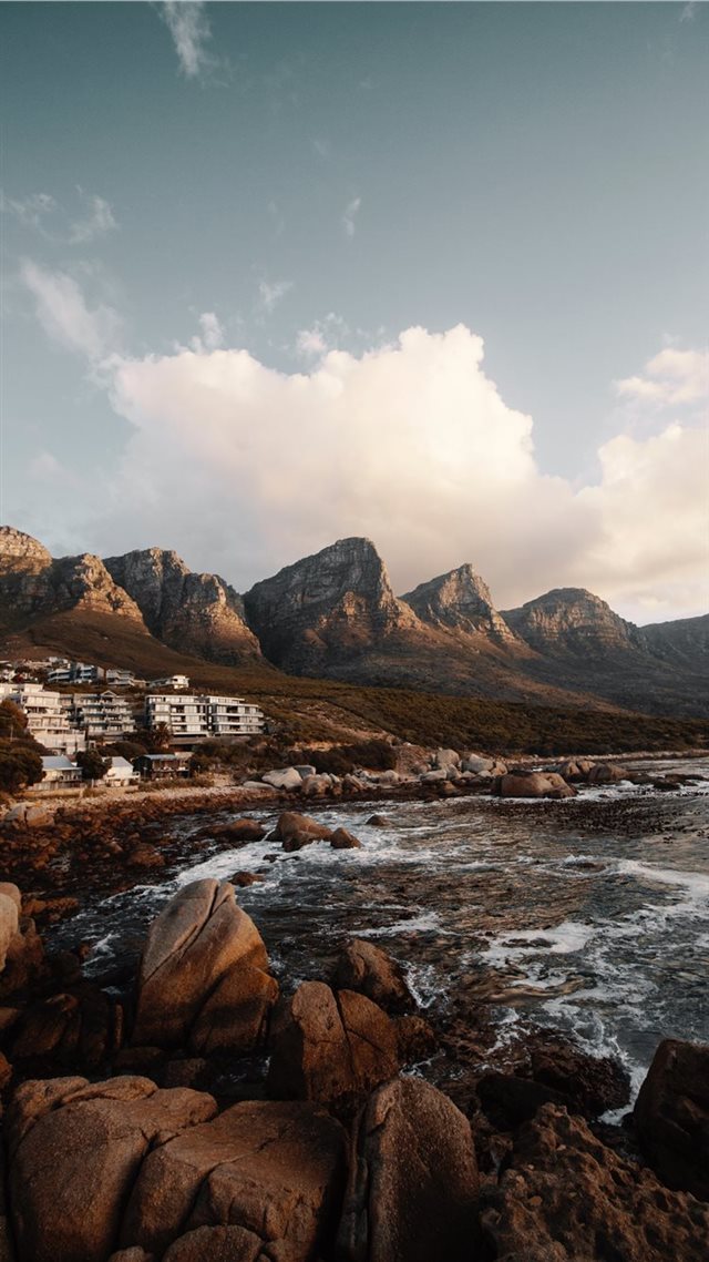 1080x1920 overlooking building nearby mountain - ocean iPhone 8 Wallpaper