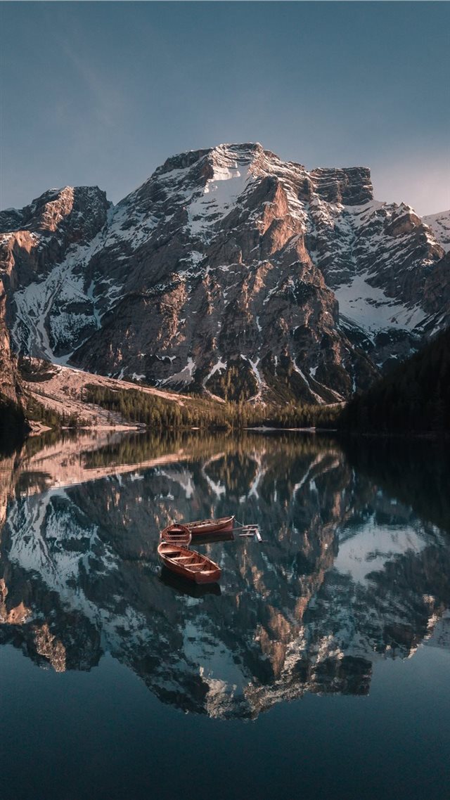 1080x1920 empty boats on body of water near glacier mountain... - lago di braies iPhone 8 Wallpaper