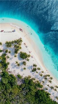 people on beach island during daytime wallpaper