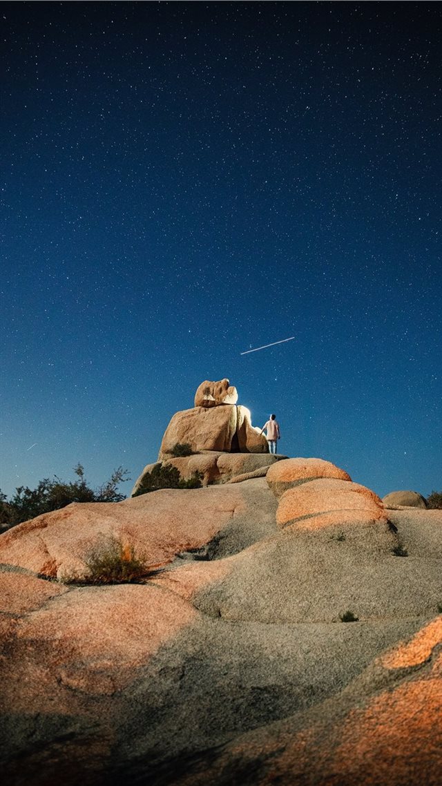 1080x1920 person standing on cliff at night - usa iPhone 8 Wallpaper