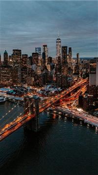 aerial photography of buildings and bridge wallpaper