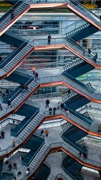 people walking in building wallpaper