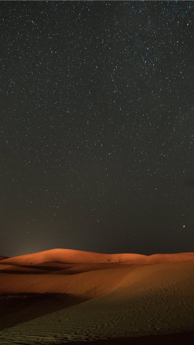 1080x1920 stars across the sky view at the desert - space iPhone 8 Wallpaper