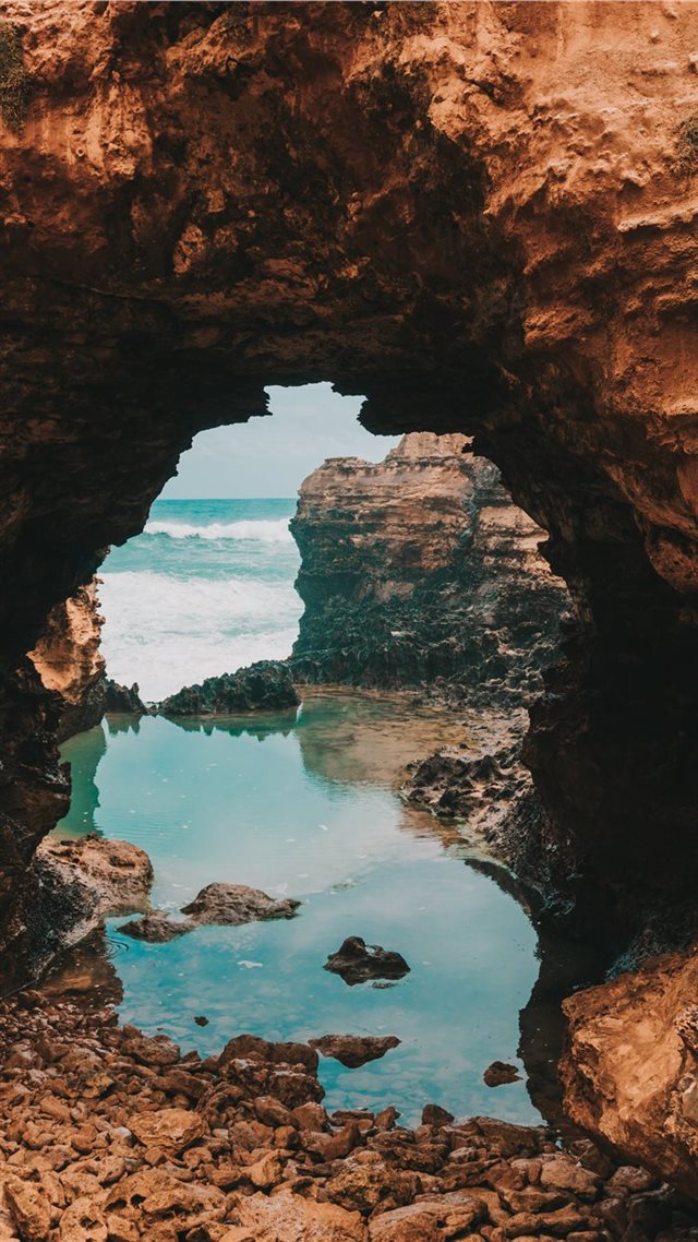 1080x1920 Sea through the rocks - australia iPhone 8 Wallpaper