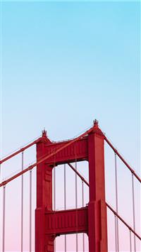 Golden Gate Bridge under a calm blue sky wallpaper
