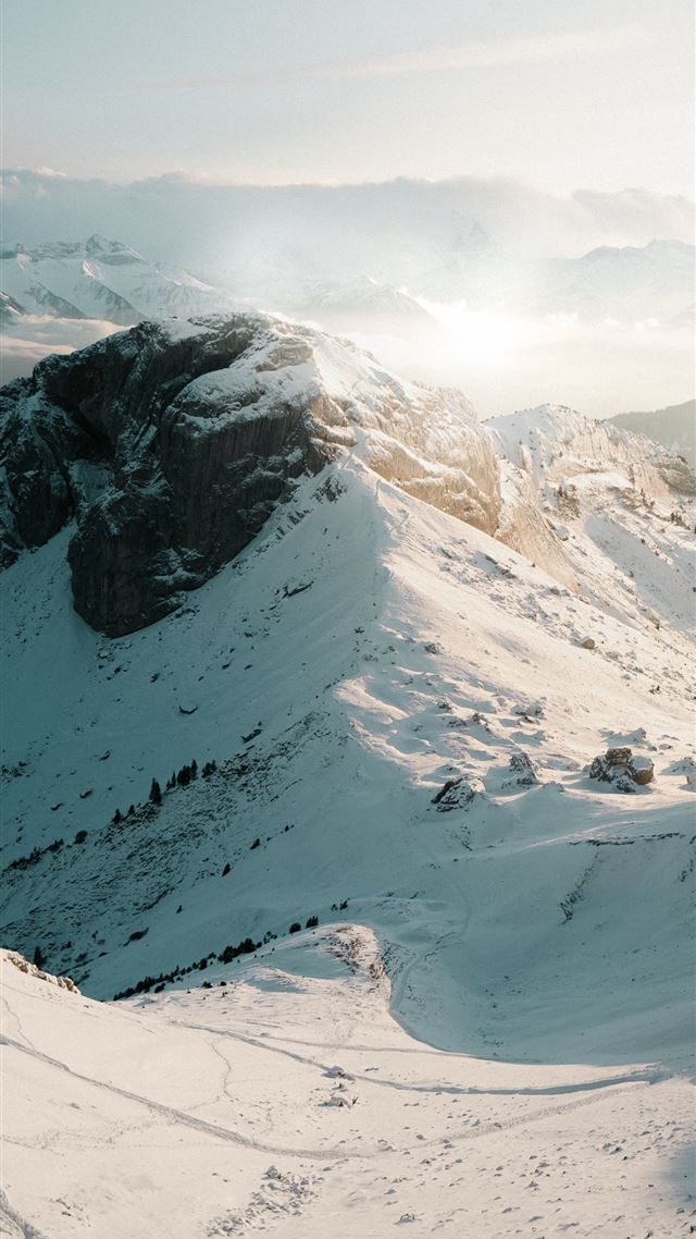1080x1920 snow covered mountain during daytime - switzerland iPhone 8 Wallpaper